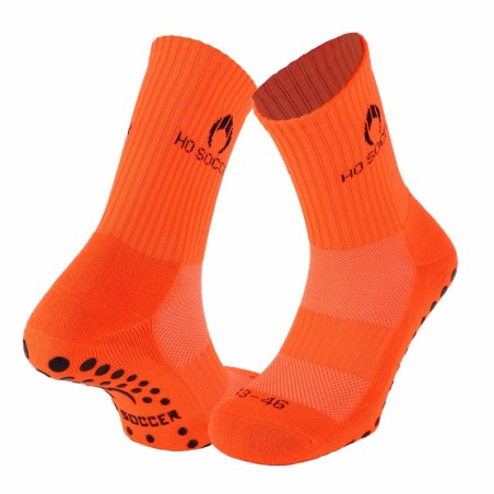 Calcetín deportivo antideslizante naranja fluor