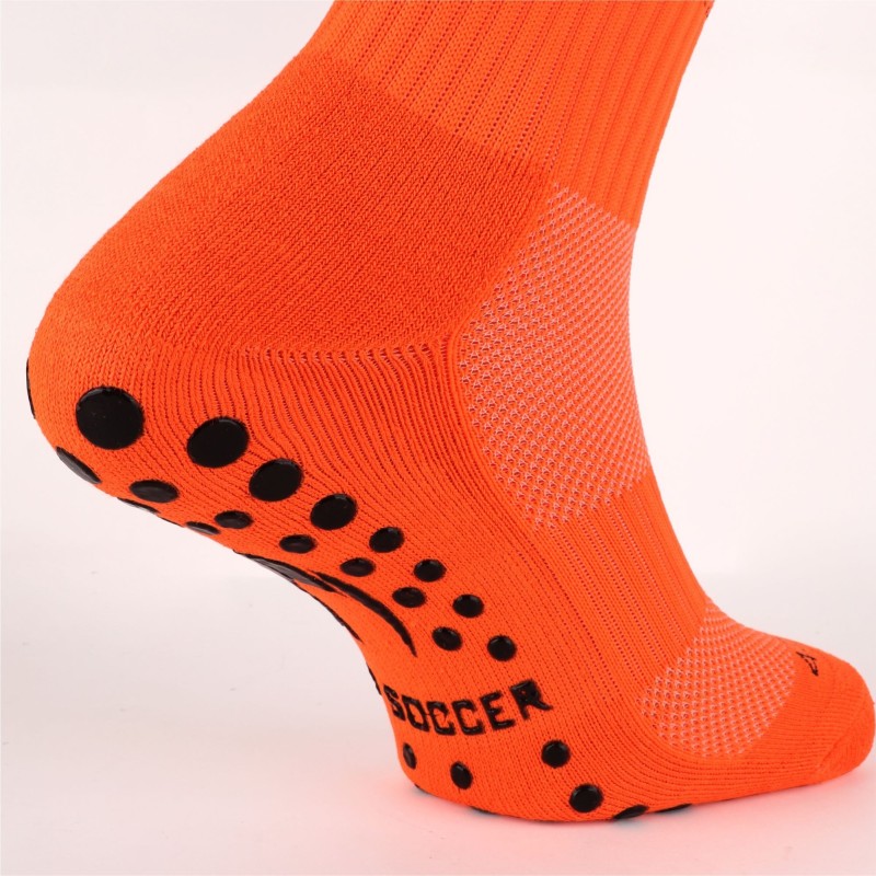 Calcetín deportivo antideslizante naranja fluor