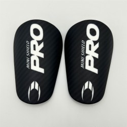 Mini Espinilleras Negras