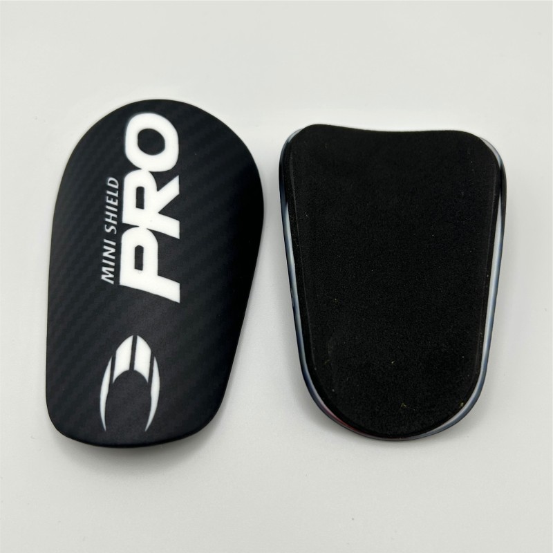 Mini Espinilleras Negras